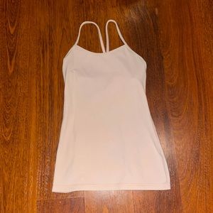 Very light pink lulu lemon tank top with built in sports bra. Size:4